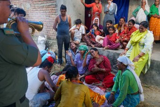 In Nepal, Funeral Rites Must Wait for Migrant Sons to Return